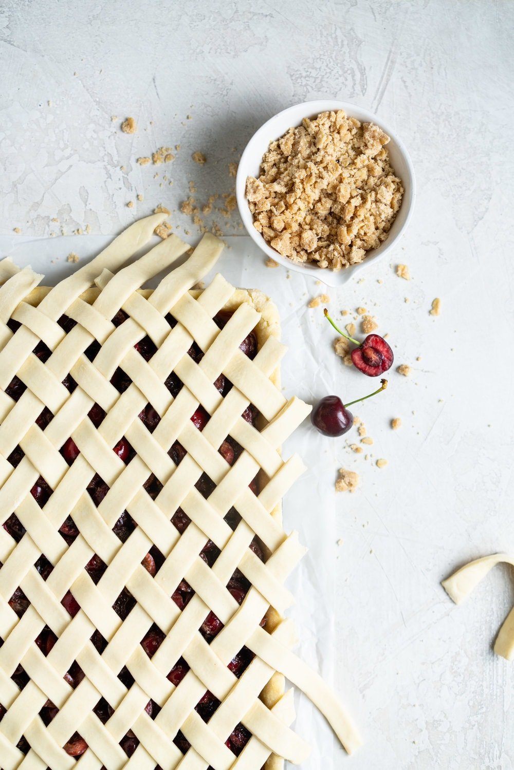 Cherry Slab Pie with Brown Butter Oat Streusel - a thick cherry slab pie is topped with a layer of flaky pastry and finished with a brown butter oat streusel that gives the most perfect crunch. #slabpie #streusel #cherrypie #cherryslabpie