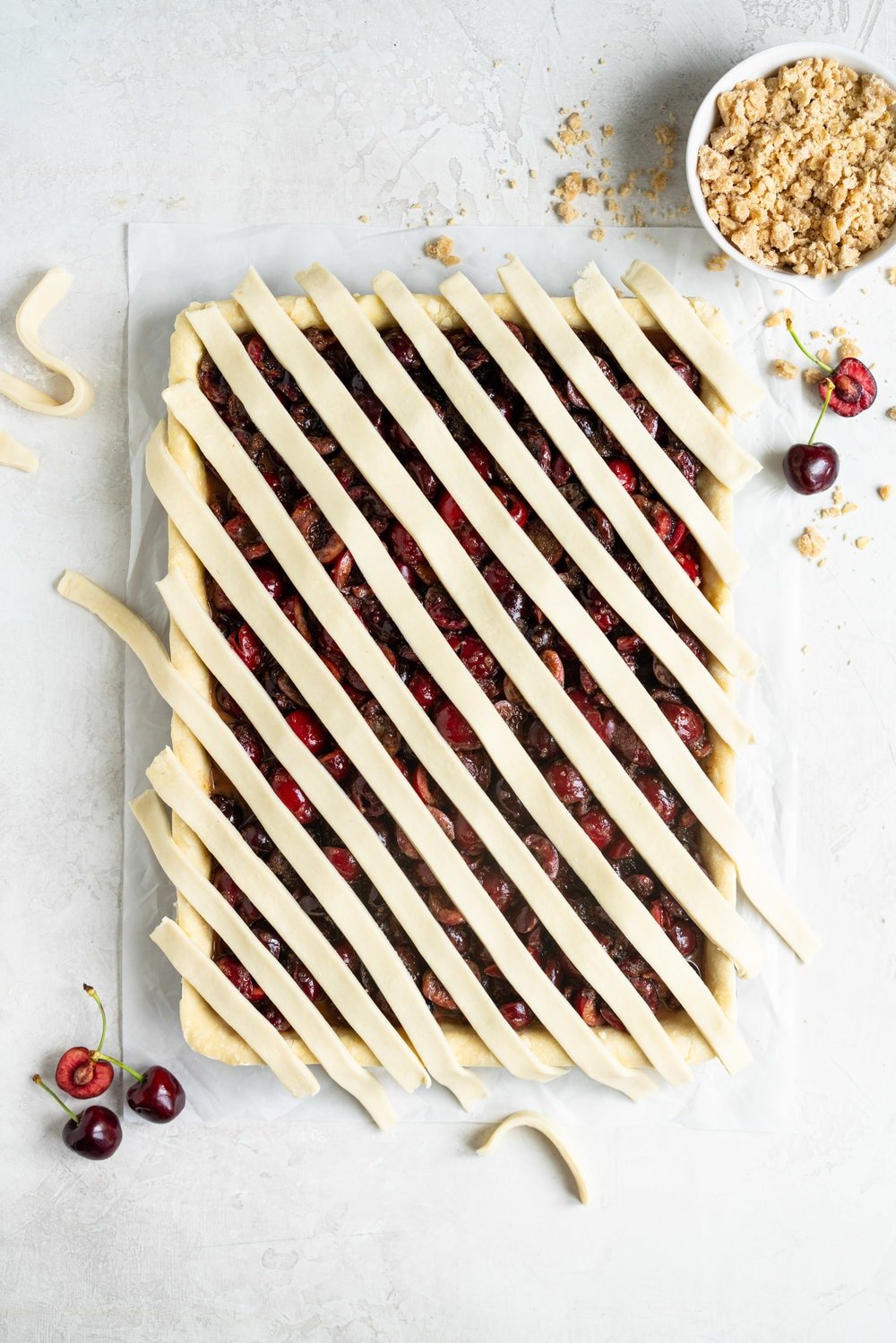 Cherry Slab Pie with Brown Butter Oat Streusel - a thick cherry slab pie is topped with a layer of flaky pastry and finished with a brown butter oat streusel that gives the most perfect crunch. #slabpie #streusel #cherrypie #cherryslabpie