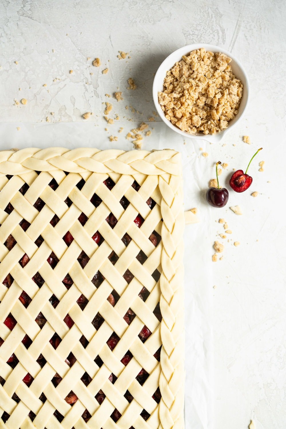 Cherry Slab Pie with Brown Butter Oat Streusel - a thick cherry slab pie is topped with a layer of flaky pastry and finished with a brown butter oat streusel that gives the most perfect crunch. #slabpie #streusel #cherrypie #cherryslabpie