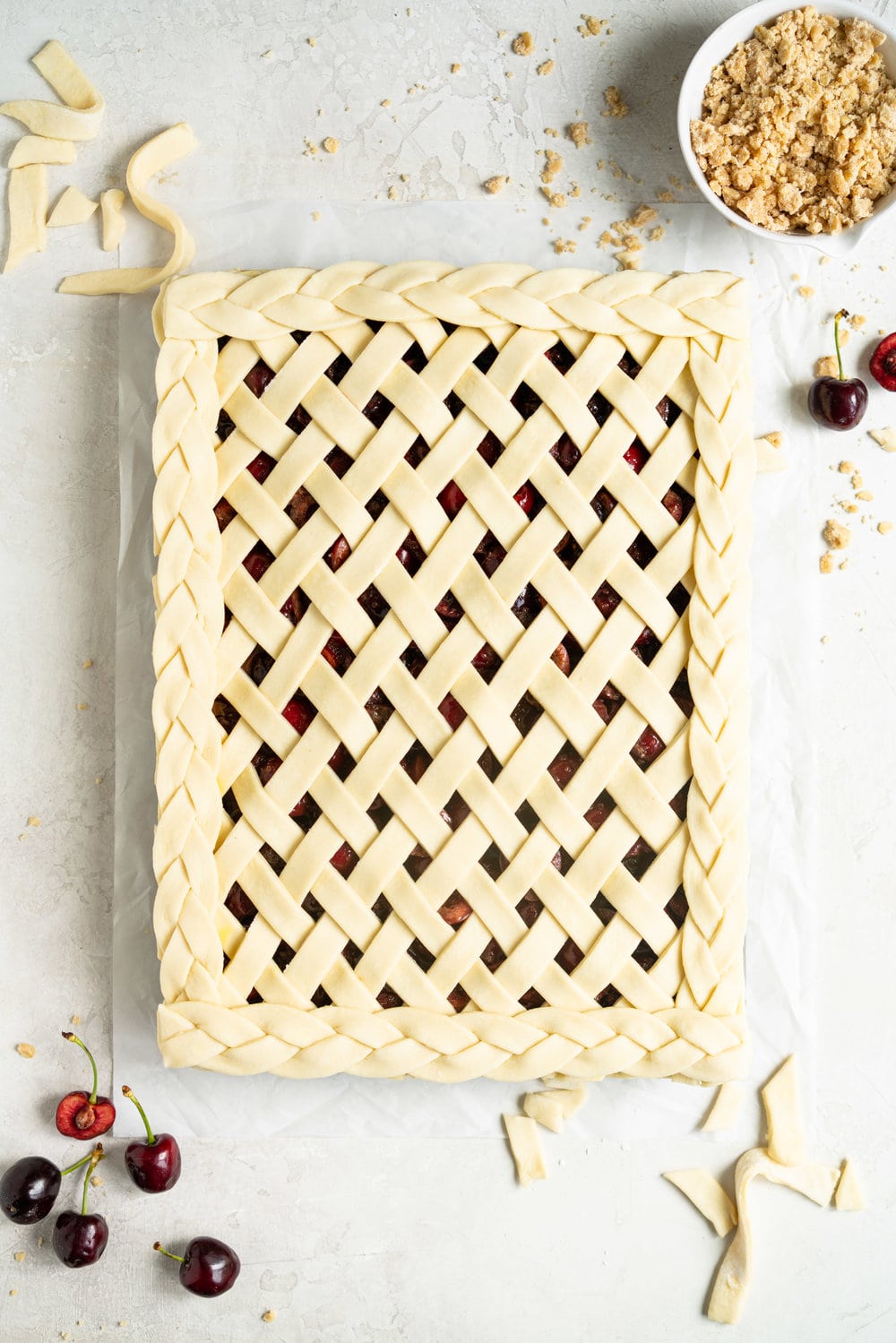 Cherry Slab Pie with Brown Butter Oat Streusel - a thick cherry slab pie is topped with a layer of flaky pastry and finished with a brown butter oat streusel that gives the most perfect crunch. #slabpie #streusel #cherrypie #cherryslabpie