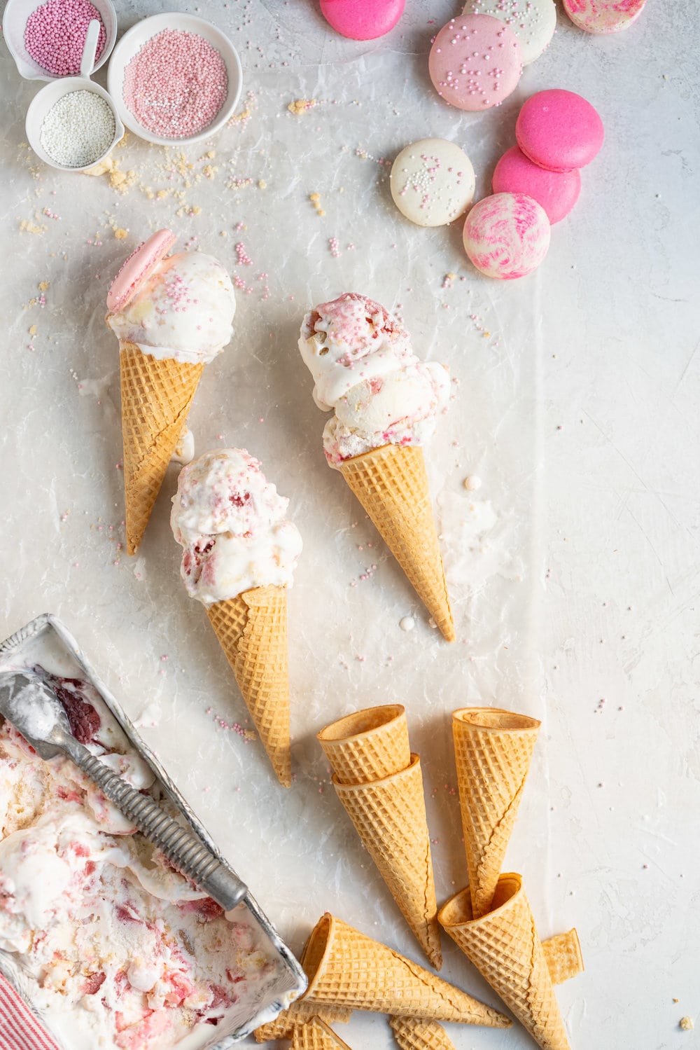 Strawberry shortcake macaron ice cream - the makings of strawberry shortcake macarons are layered up in a creamy philadelphia style ice cream base and frozen up into the perfect treat #philadelphiastyle #icecream #macaronicecream