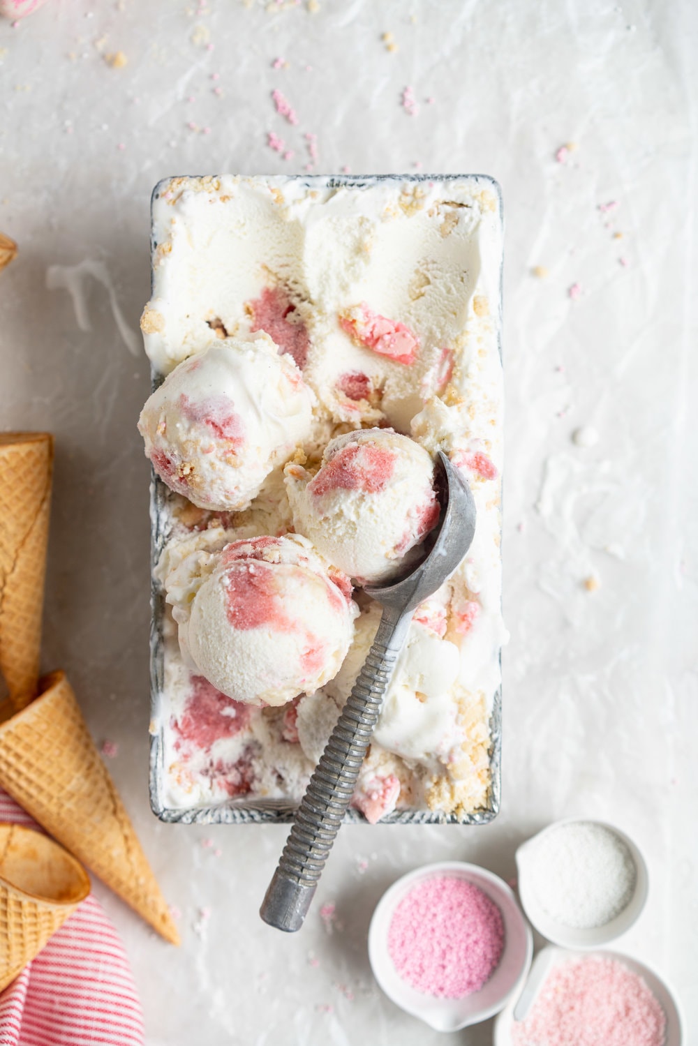 Strawberry shortcake macaron ice cream - the makings of strawberry shortcake macarons are layered up in a creamy philadelphia style ice cream base and frozen up into the perfect treat #philadelphiastyle #icecream #macaronicecream