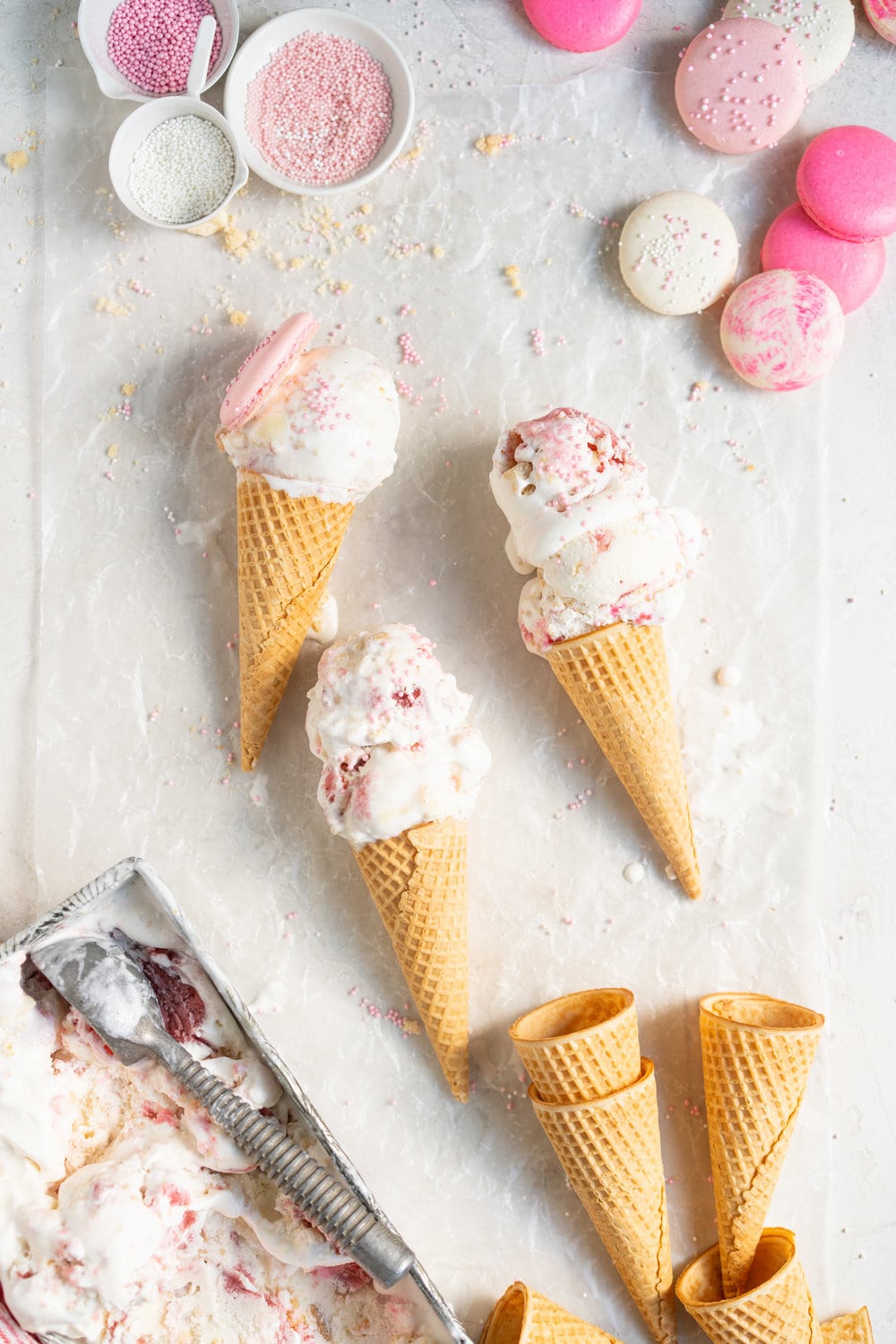 Strawberry shortcake macaron ice cream - the makings of strawberry shortcake macarons are layered up in a creamy philadelphia style ice cream base and frozen up into the perfect treat #philadelphiastyle #icecream #macaronicecream