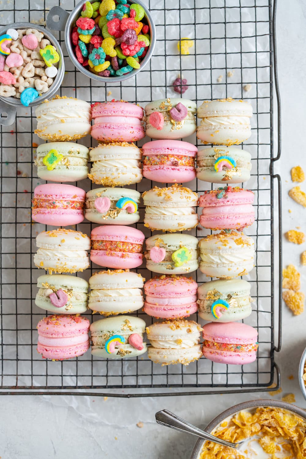 French Macarons with Cereal Milk German Buttercream. These Easy French Macarons are filled with a cereal infused german buttercream. They are an elevated version of your favourite childhood cereal. Frosted Flakes, Lucky Charms, Trix. #frenchmacarons #easymacarons #macaronrecipe