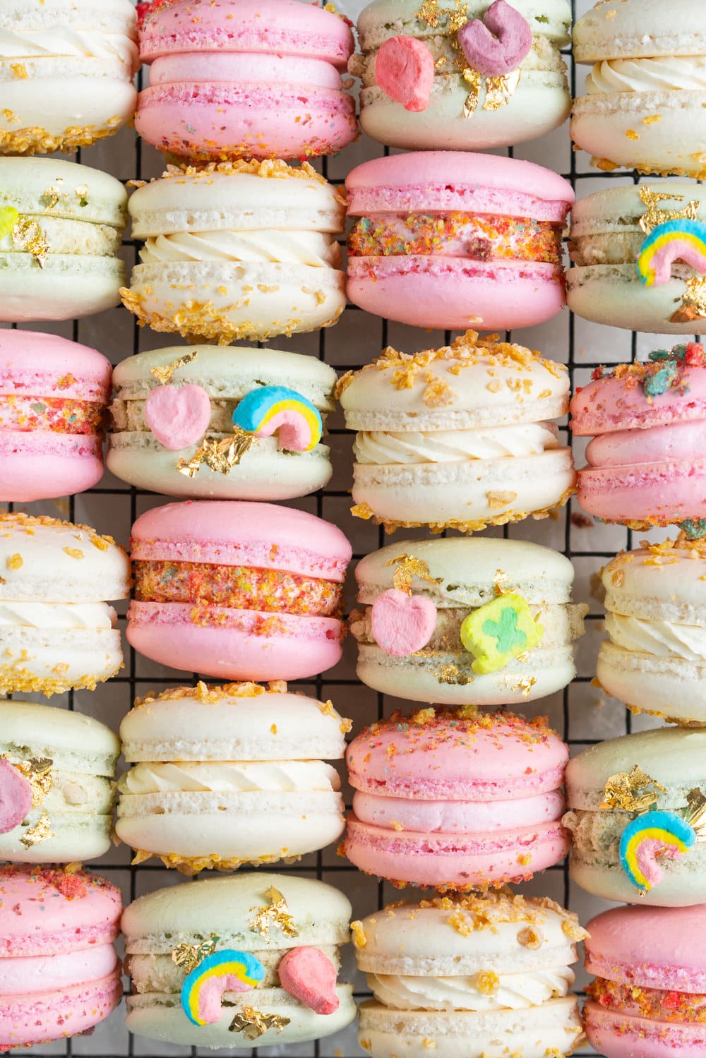 French Macarons with Cereal Milk German Buttercream. These Easy French Macarons are filled with a cereal infused german buttercream. They are an elevated version of your favourite childhood cereal. Frosted Flakes, Lucky Charms, Trix. #frenchmacarons #easymacarons #macaronrecipe