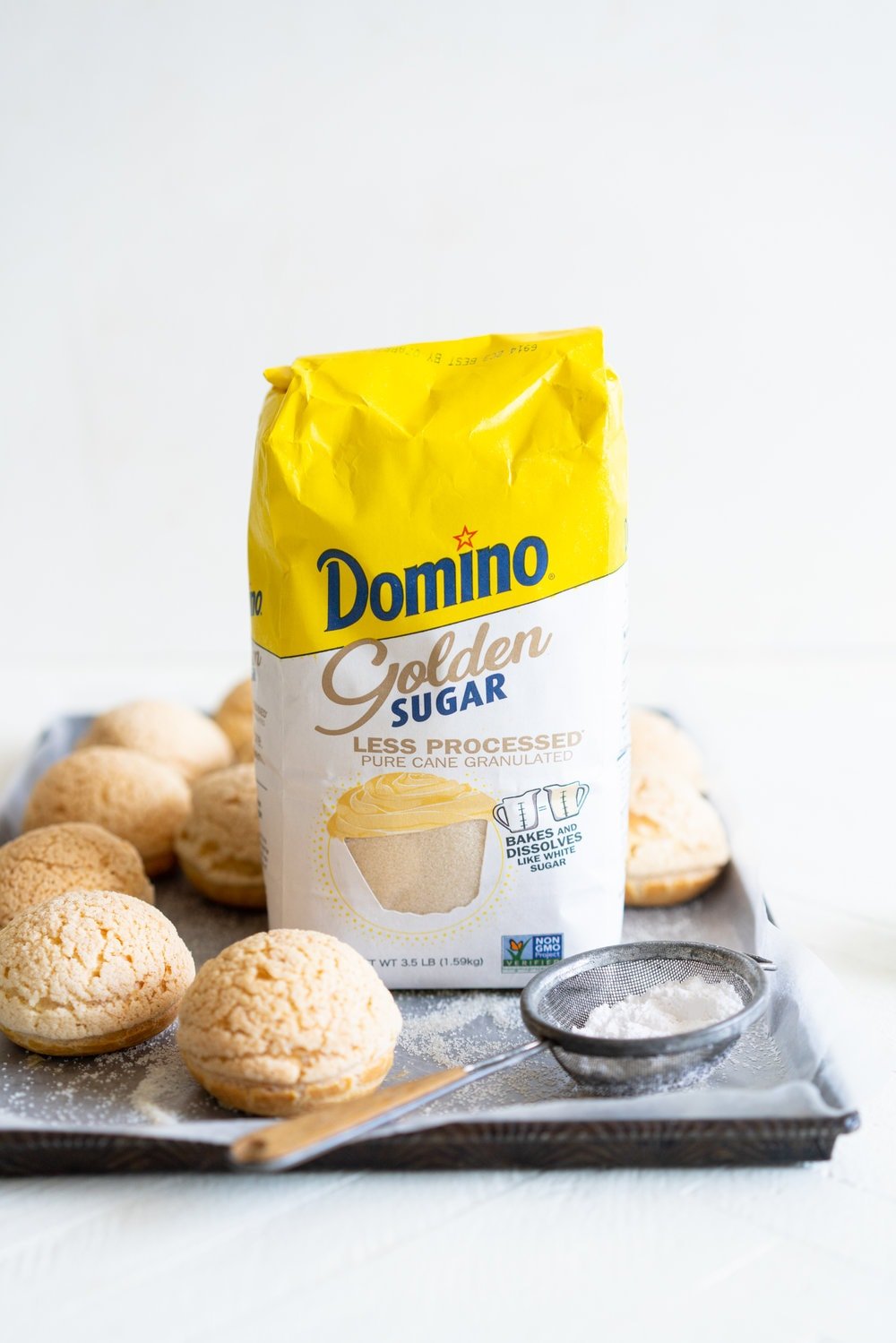 Golden Sugar Choux au Craquelin - Cream Puffs with Salted Caramel Diplomat Cream. These easy cream puffs, topped with crispy craquelin, are stuffed full with a salted caramel pastry cream, which is folded into softly whipped cream to form salted caramel diplomat cream. #creampuffs #chouxaucraquelin #saltedcaramel #diplomatcream