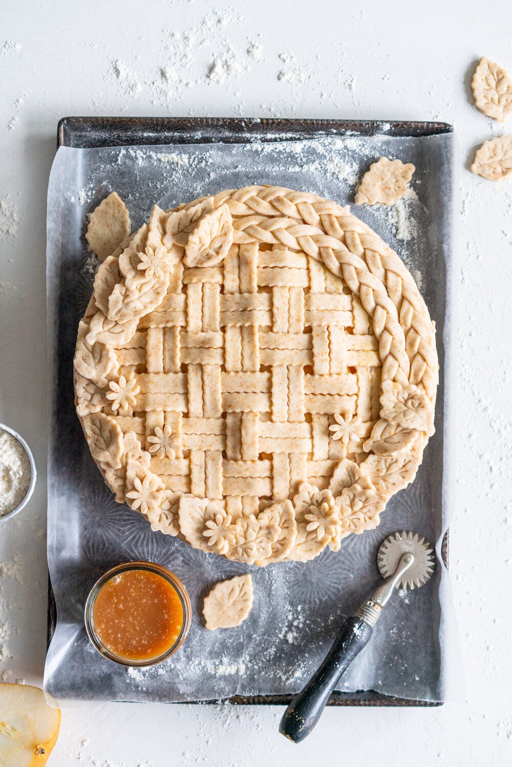 Pear Pie with Ginger Caramel and Spelt Crust - fresh pears are tucked into a pie with a fresh ginger caramel and a nutty spelt pie crust. This is the perfect easy alternative to a caramel apple pie, and the addition of spelt to the pie crust ramps up the flavour. #pearpie #pearcaramelpie #spelt