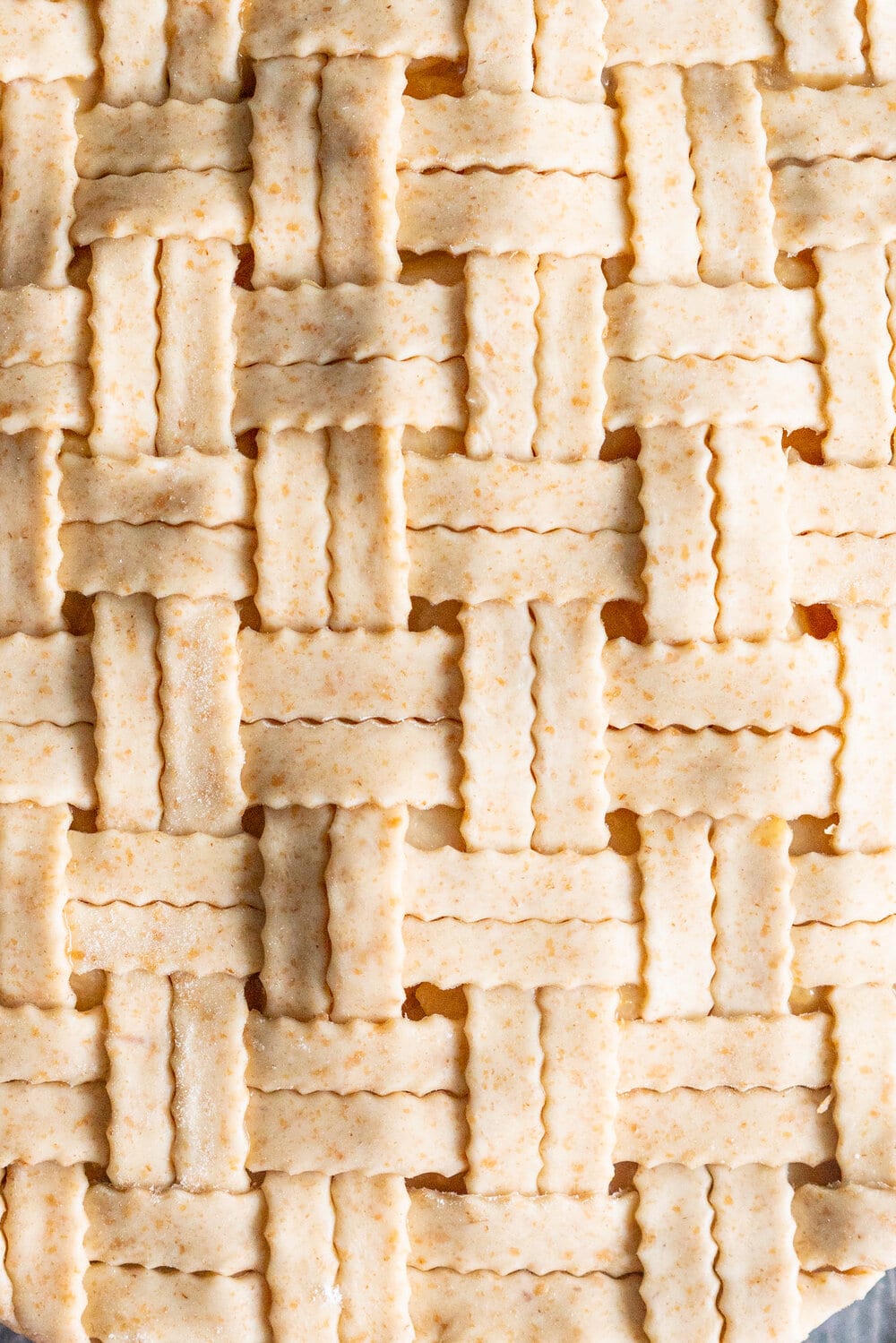 Pear Pie with Ginger Caramel and Spelt Crust - fresh pears are tucked into a pie with a fresh ginger caramel and a nutty spelt pie crust. This is the perfect easy alternative to a caramel apple pie, and the addition of spelt to the pie crust ramps up the flavour. #pearpie #pearcaramelpie #spelt