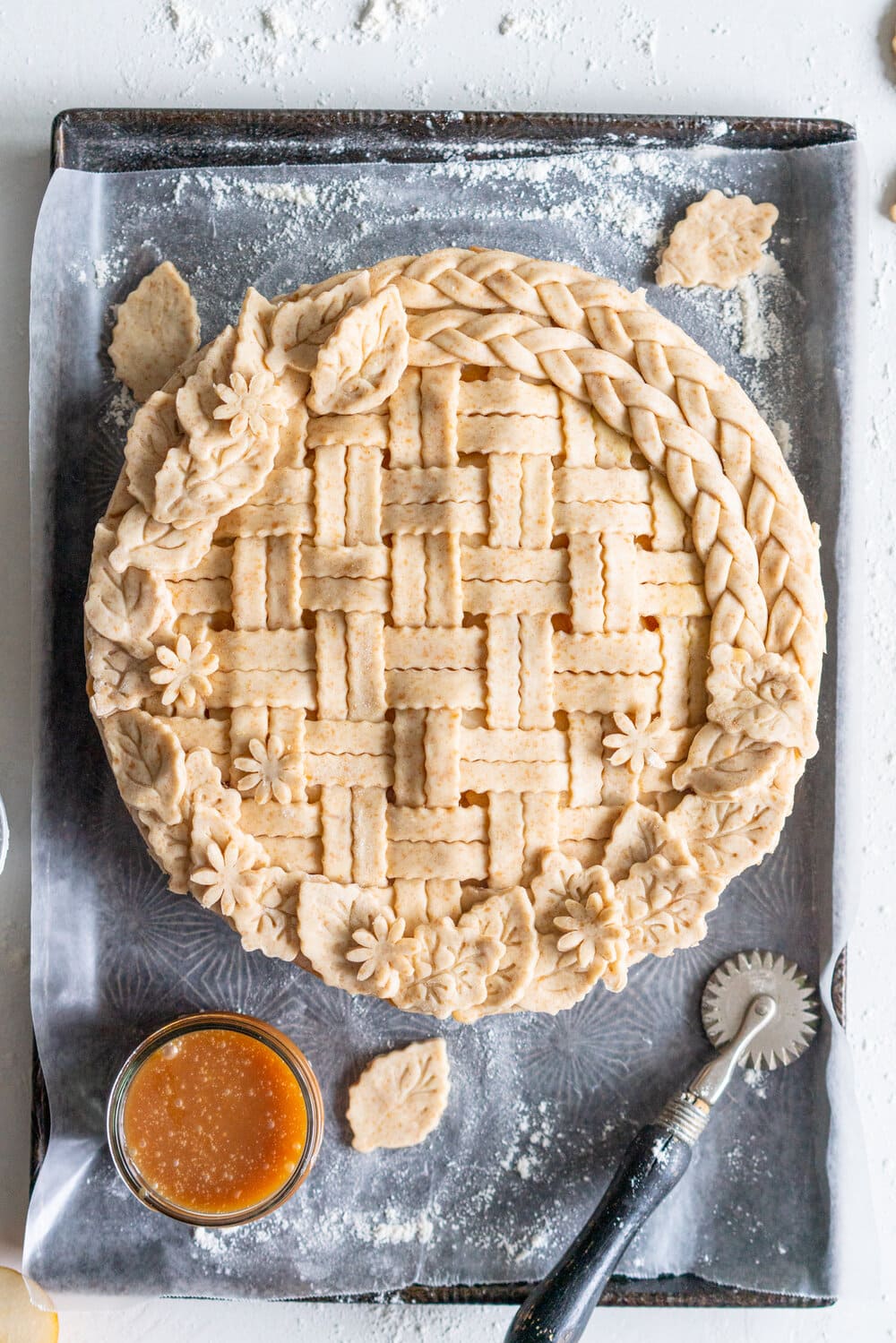 Pear Pie with Ginger Caramel and Spelt Crust - fresh pears are tucked into a pie with a fresh ginger caramel and a nutty spelt pie crust. This is the perfect easy alternative to a caramel apple pie, and the addition of spelt to the pie crust ramps up the flavour. #pearpie #pearcaramelpie #spelt