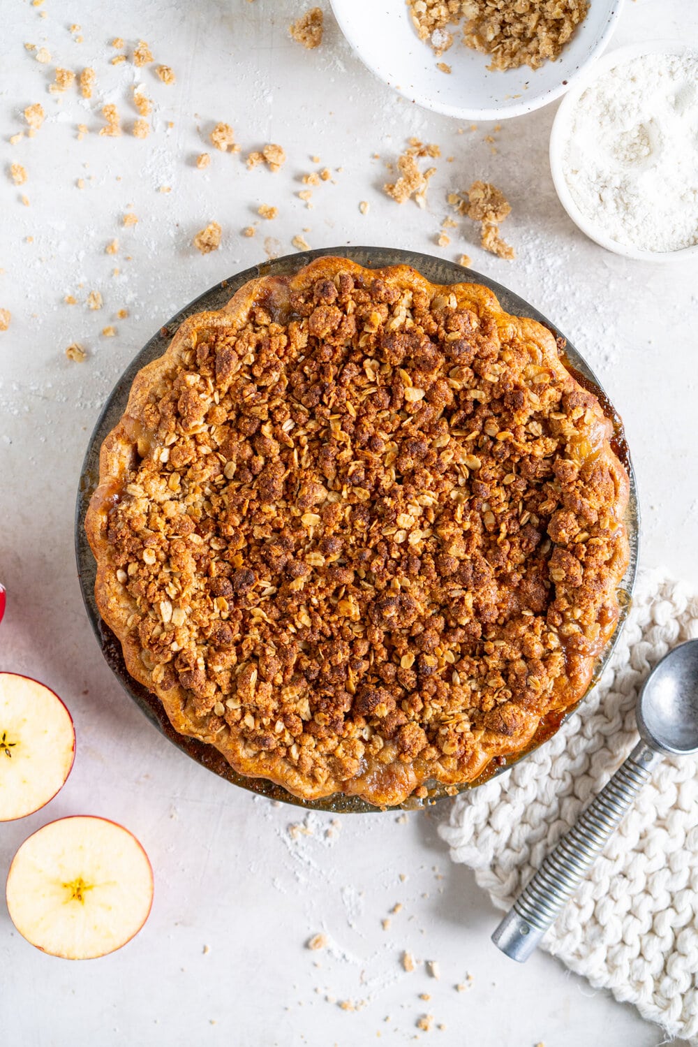 Apple Crumble Pie with Rye Crust - a toasty rye pie crust is filled with apple filling and topped with an oaty crumble that is baked until perfectly golden. A combination of two of the best apple desserts - apple pie and apple crumble. A delicious twist on the classic apple pie. #applecrumble #applecrumblepie #applecrumbpie