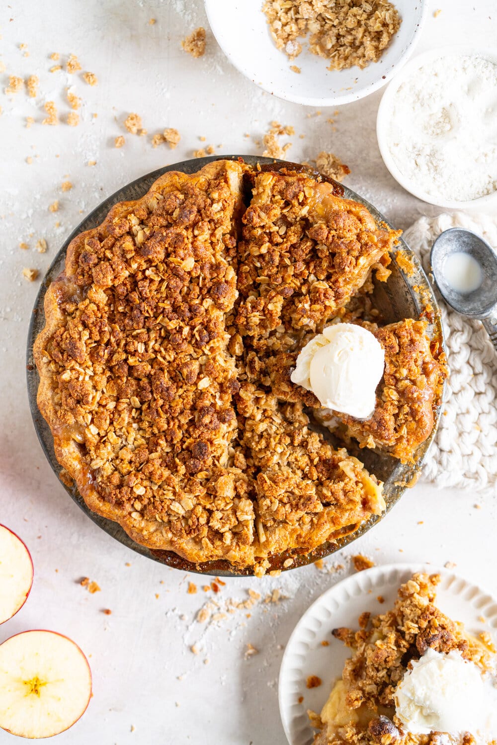 Apple Crumble Pie with Rye Crust - a toasty rye pie crust is filled with apple filling and topped with an oaty crumble that is baked until perfectly golden. A combination of two of the best apple desserts - apple pie and apple crumble. A delicious twist on the classic apple pie. #applecrumble #applecrumblepie #applecrumbpie