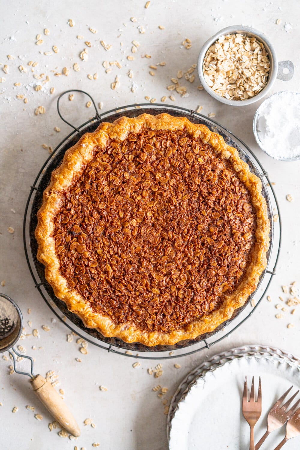 Brown Butter Oatmeal Pie - this is a pecan pie but without the pecans, which makes it the perfect pie for those who can't have nuts but still want the pecan pie experience. Toasted oats are mixed with brown butter and golden syrup for a chewy, perfect pie.