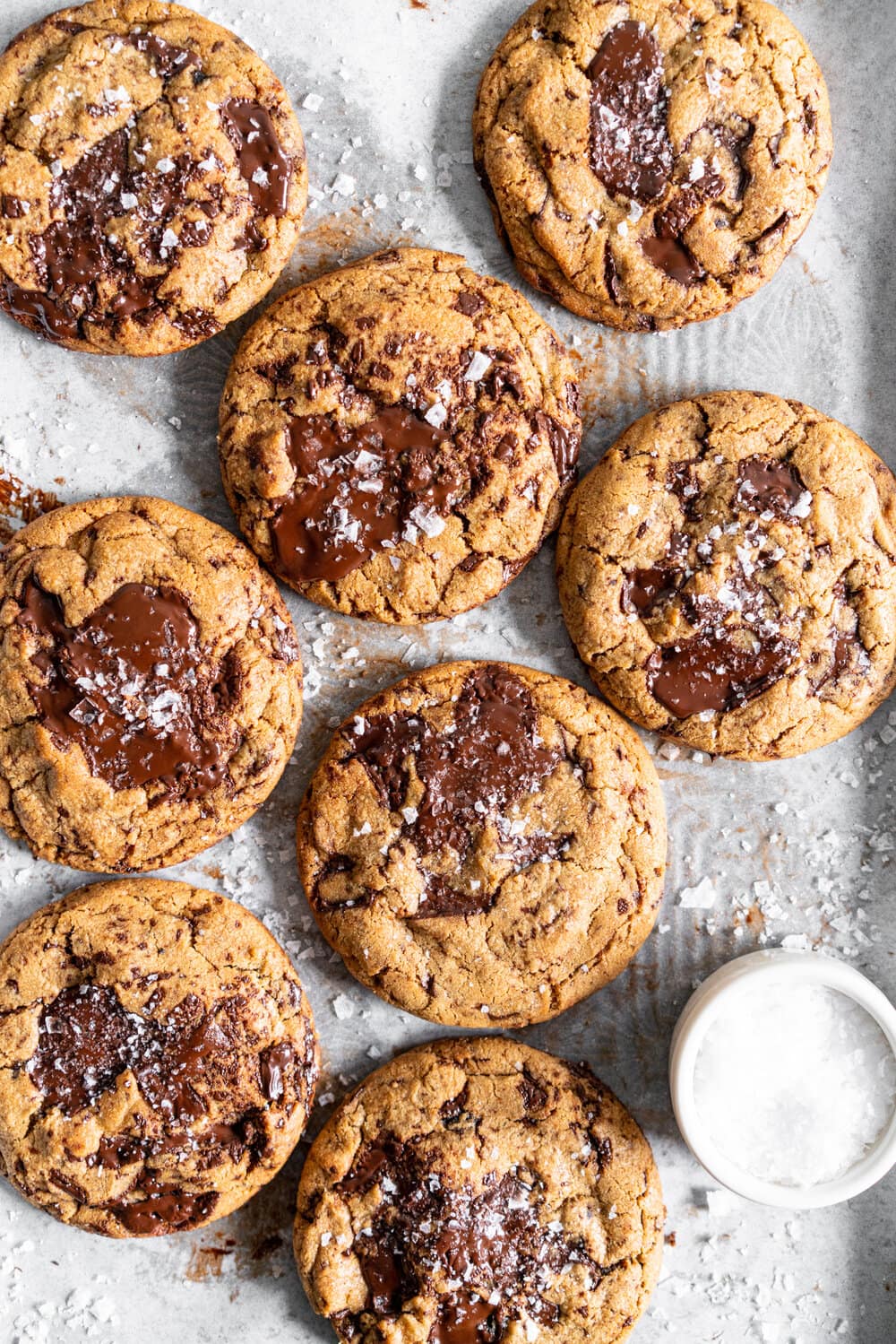Dark Chocolate Peanut Butter Stuffed Chocolate Chip Cookies. Discs of Dark Chocolate Peanut Butter are stuffed into the middle of a no chill chocolate chip cookie for the most perfect peanut butter stuffed cookie situation. #peanutbutter #peanutbutterstuffedcookie #stuffedcookie