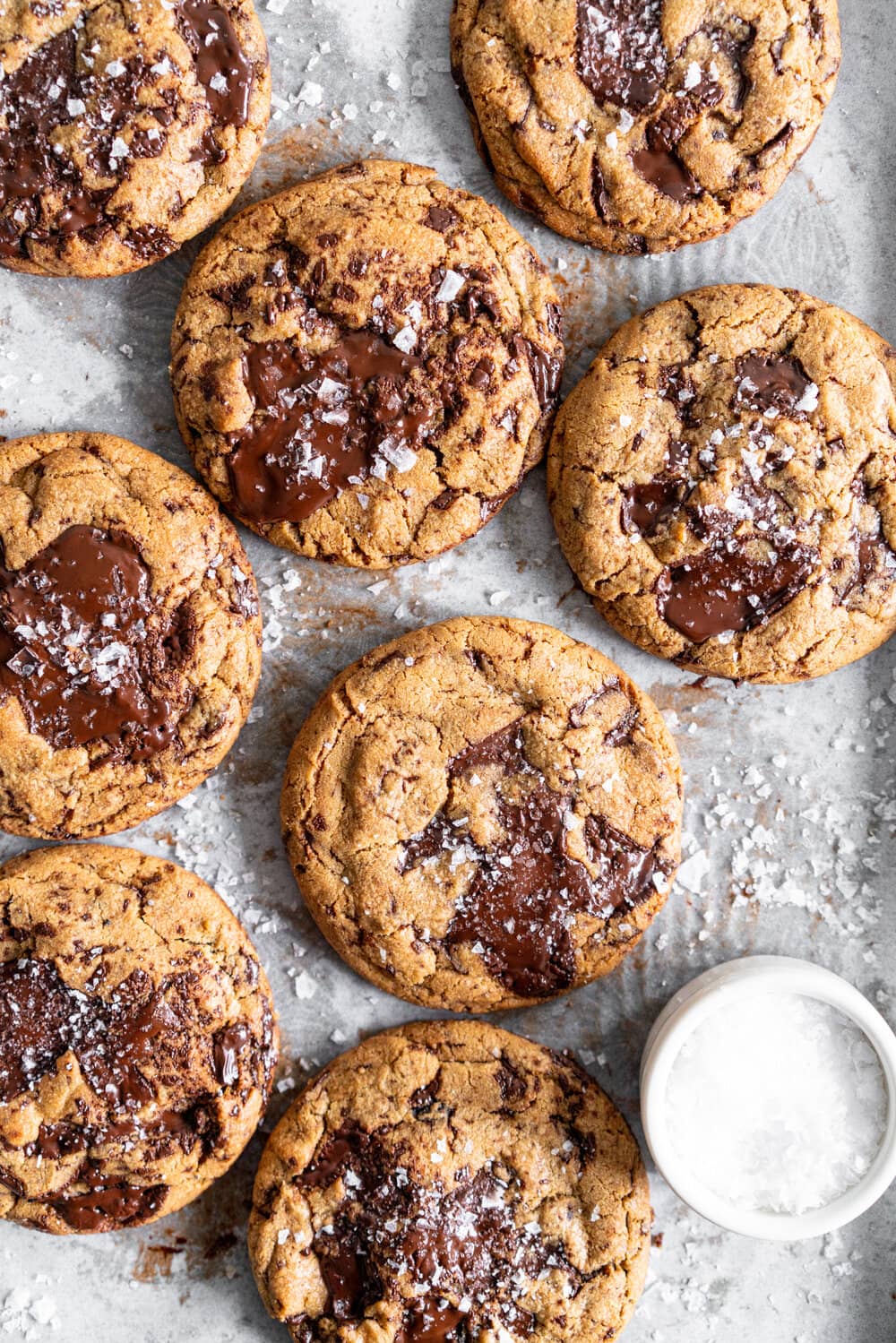Dark Chocolate Peanut Butter Stuffed Chocolate Chip Cookies. Discs of Dark Chocolate Peanut Butter are stuffed into the middle of a no chill chocolate chip cookie for the most perfect peanut butter stuffed cookie situation. #peanutbutter #peanutbutterstuffedcookie #stuffedcookie