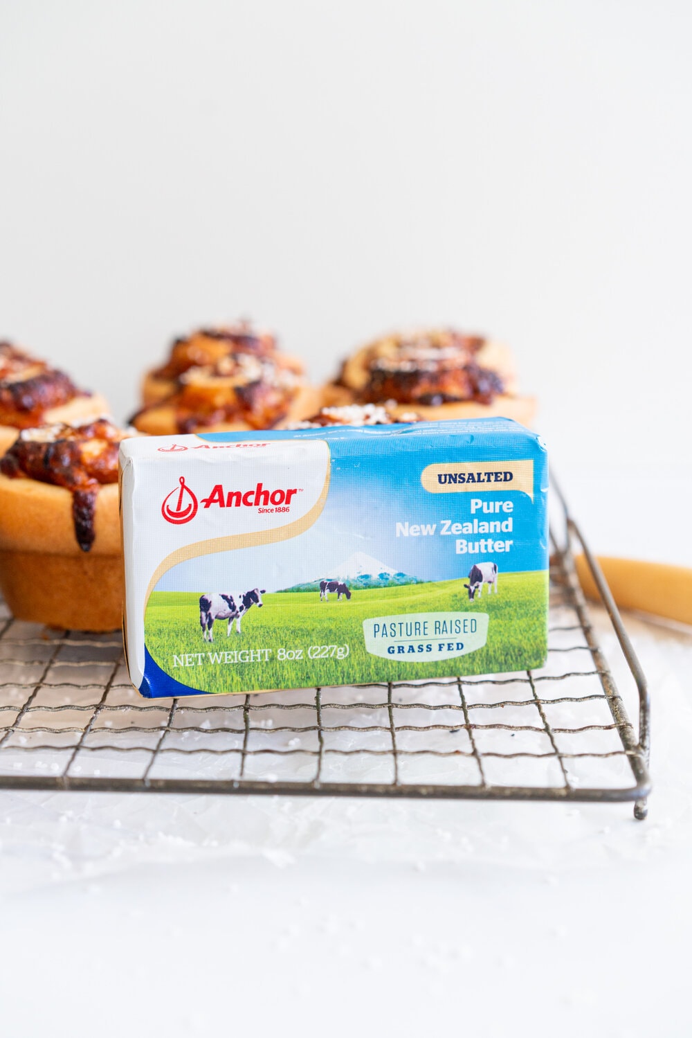 Sharp Cheddar cheese and caramelised onion brioche rolls. Fluffy brioche is spread with sweet caramelised onions and sprinkled with grated sharp cheddar, then rolled into perfect rolls and baked to perfection - cheesy onion goodness. These are easy to make and make the perfect savoury breakfast or brunch treat.