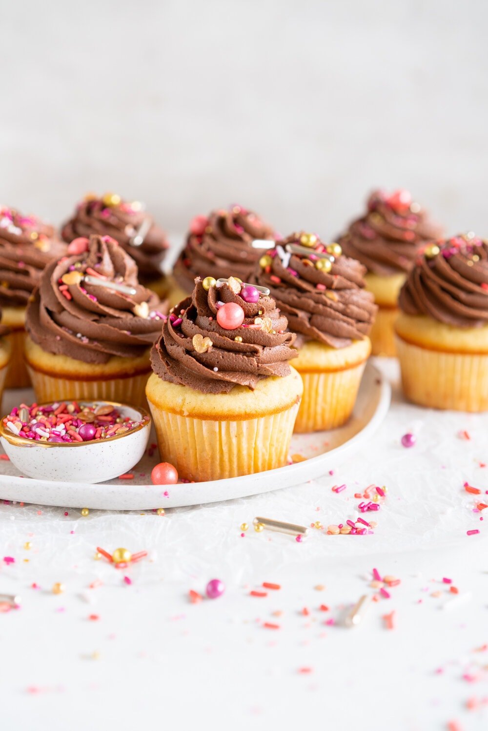 Vanilla Bean Cupcakes with Chocolate Peanut Butter Buttercream. These easy, fluffy Vanilla Bean Cupcakes are topped with a swirl of chocolate peanut butter American Buttercream and finished with a healthy dose of sprinkles. Mix and match your cupcake and buttercream recipes to make your own cupcake and frosting combinations.