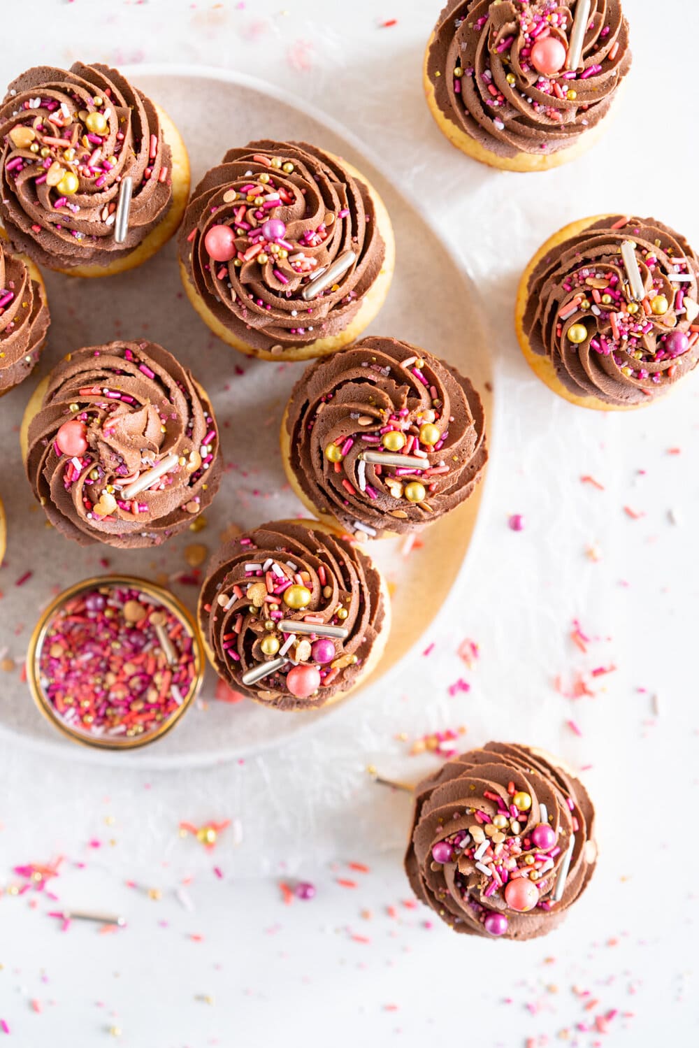 Vanilla Bean Cupcakes with Chocolate Peanut Butter Buttercream. These easy, fluffy Vanilla Bean Cupcakes are topped with a swirl of chocolate peanut butter American Buttercream and finished with a healthy dose of sprinkles. Mix and match your cupcake and buttercream recipes to make your own cupcake and frosting combinations.