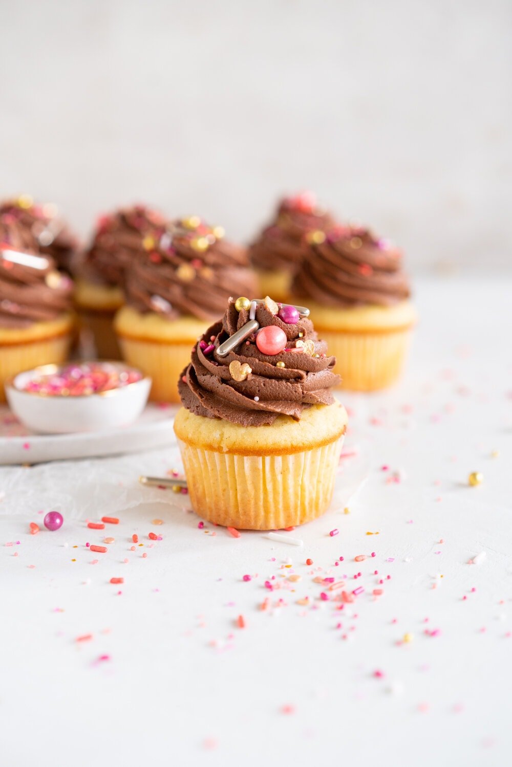 Vanilla Bean Cupcakes with Chocolate Peanut Butter Buttercream. These easy, fluffy Vanilla Bean Cupcakes are topped with a swirl of chocolate peanut butter American Buttercream and finished with a healthy dose of sprinkles. Mix and match your cupcake and buttercream recipes to make your own cupcake and frosting combinations.