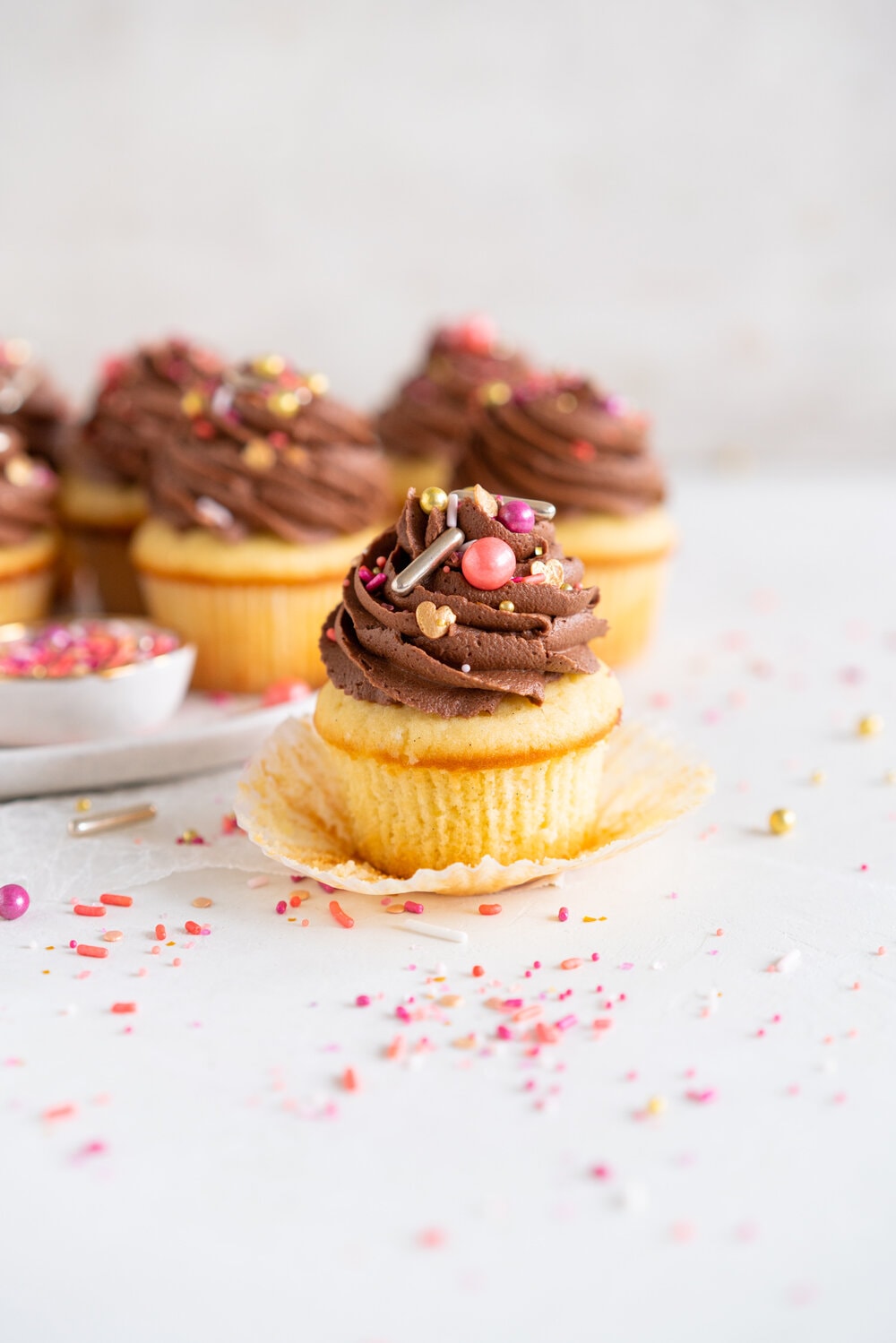 Vanilla Bean Cupcakes with Chocolate Peanut Butter Buttercream. These easy, fluffy Vanilla Bean Cupcakes are topped with a swirl of chocolate peanut butter American Buttercream and finished with a healthy dose of sprinkles. Mix and match your cupcake and buttercream recipes to make your own cupcake and frosting combinations.
