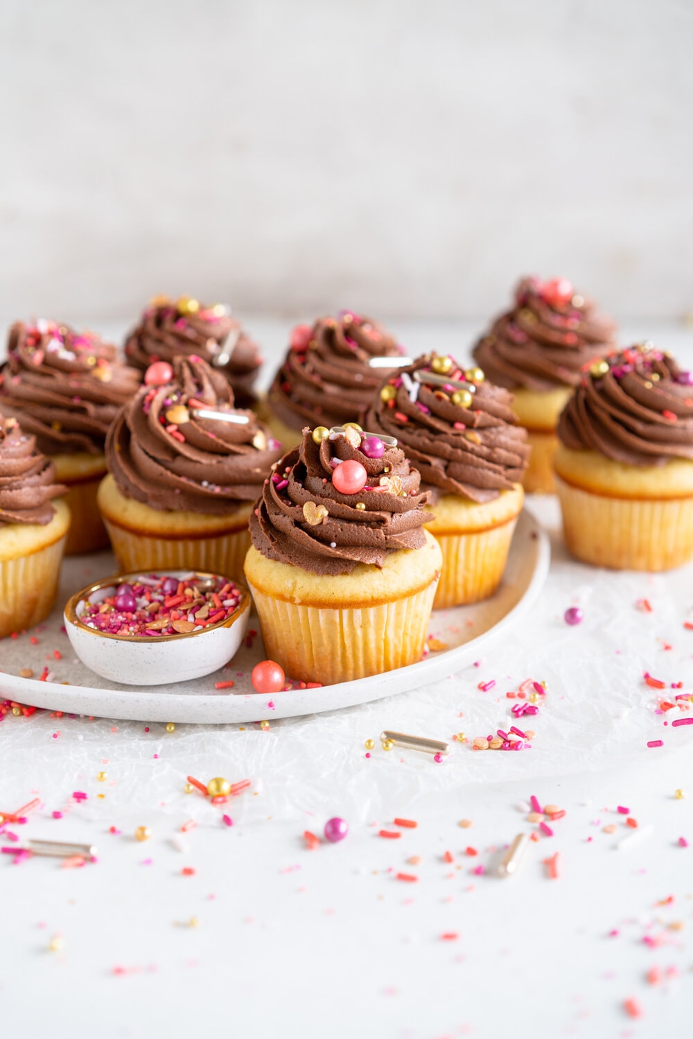 Vanilla Bean Cupcakes with Chocolate Peanut Butter Buttercream. These easy, fluffy Vanilla Bean Cupcakes are topped with a swirl of chocolate peanut butter American Buttercream and finished with a healthy dose of sprinkles. Mix and match your cupcake and buttercream recipes to make your own cupcake and frosting combinations.