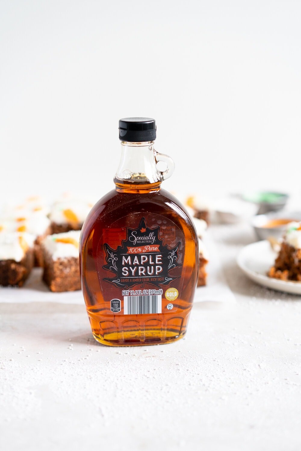 Carrot Snack Cake with Cream Cheese Frosting. This easy, moist, carrot sheet cake is the most perfect easter cake. It is made with pantry staples and finished with a simple cream cheese frosting and some super cute piped frosting carrots. This cake is great for a simple easter dessert, or for entertaining, as sheet cakes are super easy to transport.