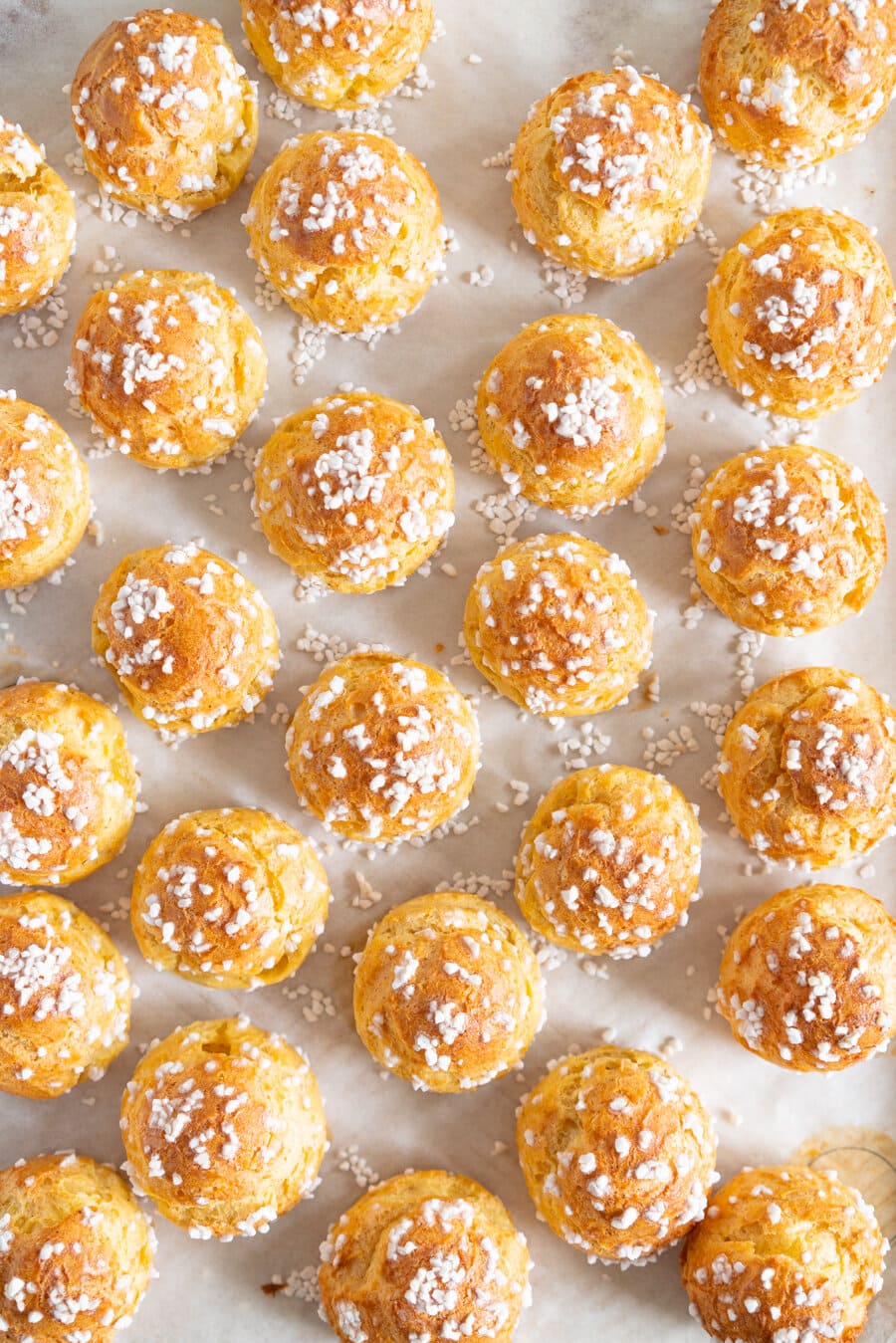 Brown Butter Chouquettes. Chouquettes are little choux pastry bites, piped into rounds and finished with pearl sugar before being baked to golden perfection. Choux is easy to make and is easy to freeze, making these the perfect treat. Brown butter choux has a delicious depth of flavour and is a perfect easy twist on a classic.