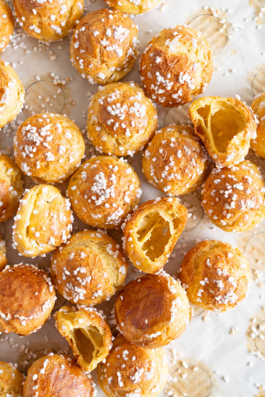 Brown Butter Chouquettes. Chouquettes are little choux pastry bites, piped into rounds and finished with pearl sugar before being baked to golden perfection. Choux is easy to make and is easy to freeze, making these the perfect treat. Brown butter choux has a delicious depth of flavour and is a perfect easy twist on a classic.