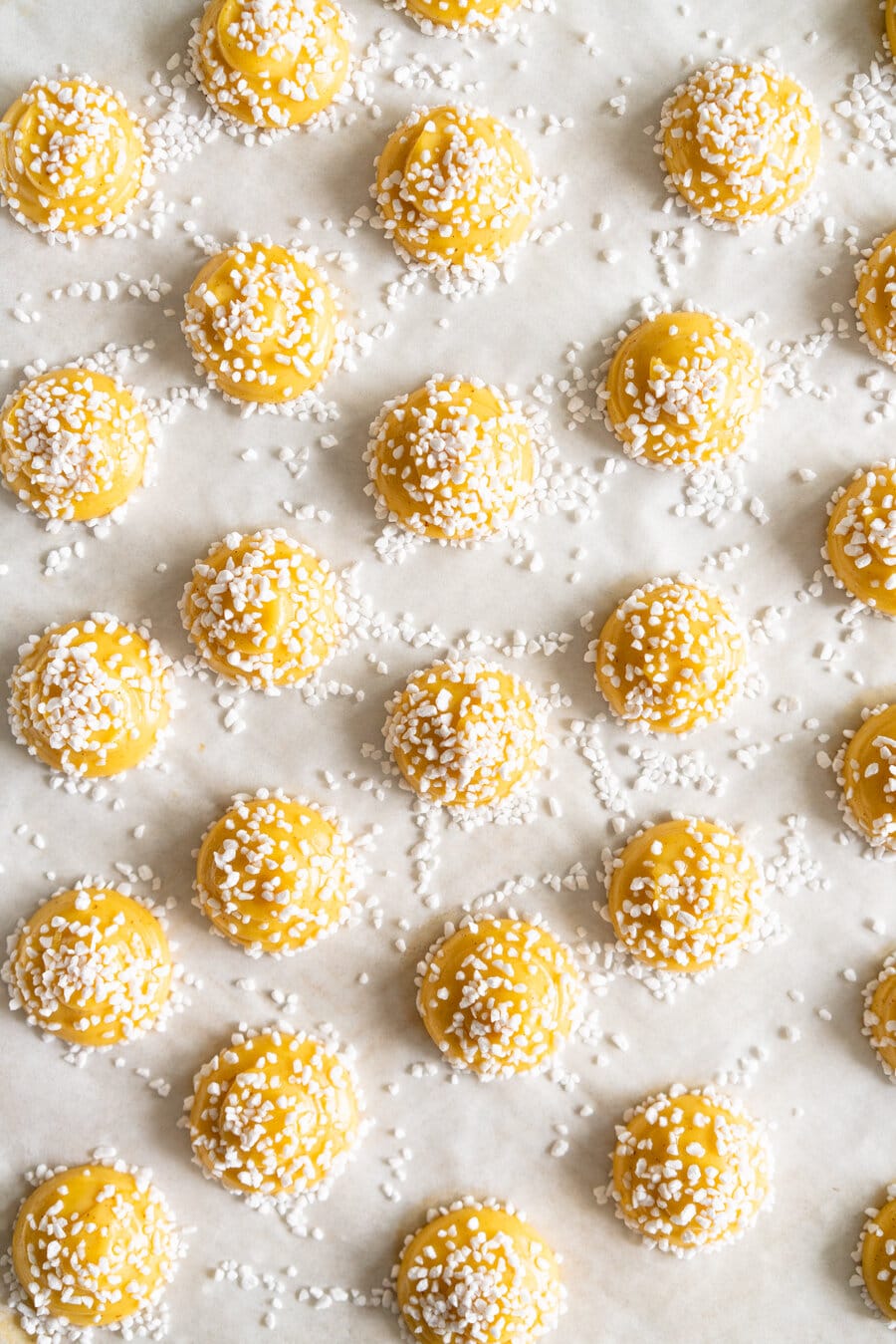 Brown Butter Chouquettes. Chouquettes are little choux pastry bites, piped into rounds and finished with pearl sugar before being baked to golden perfection. Choux is easy to make and is easy to freeze, making these the perfect treat. Brown butter choux has a delicious depth of flavour and is a perfect easy twist on a classic.