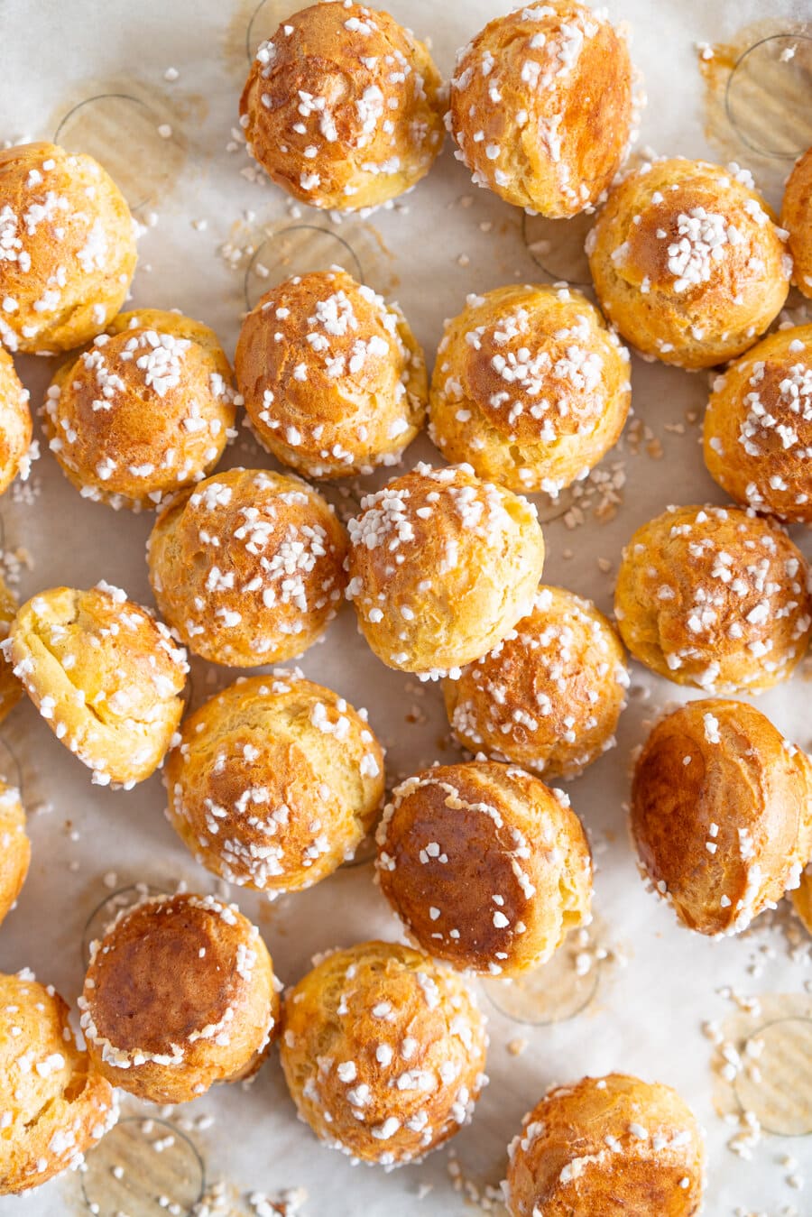 Brown Butter Chouquettes. Chouquettes are little choux pastry bites, piped into rounds and finished with pearl sugar before being baked to golden perfection. Choux is easy to make and is easy to freeze, making these the perfect treat. Brown butter choux has a delicious depth of flavour and is a perfect easy twist on a classic.