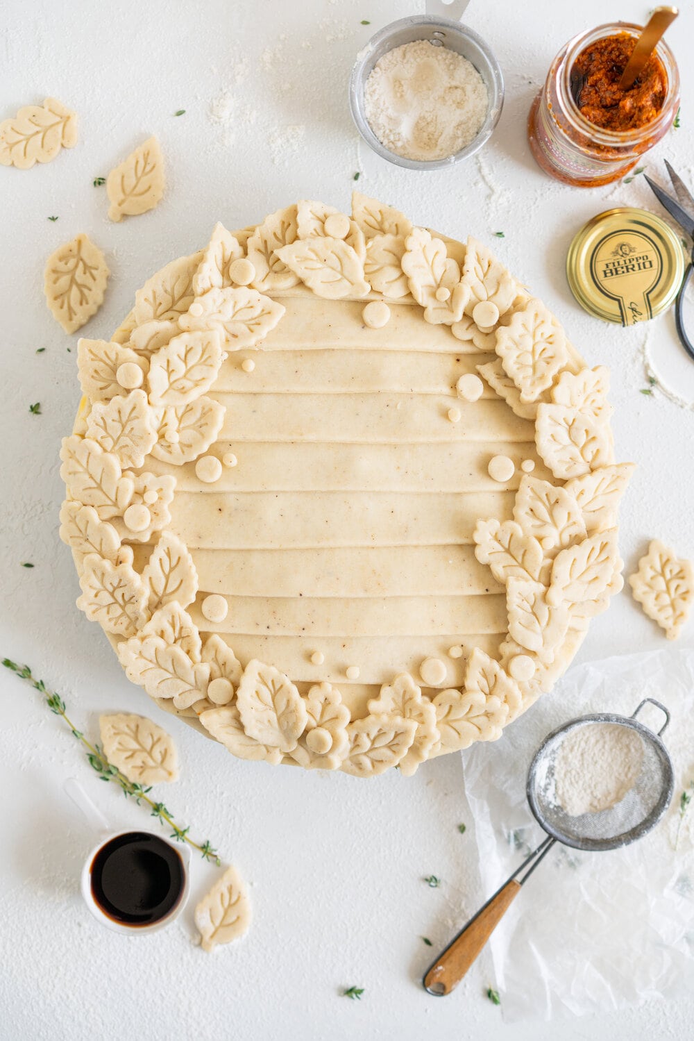 Mushroom and Sundried Tomato Pesto Pie with Parmesan and Black Pepper Crust. A rich, hearty mushroom gravy enriched with sundried tomato pesto is tucked inside a golden brown parmesan and black pepper pie crust. This is a perfect vegetarian take on the classic pot pie, and is ultimate comfort food. Mushroom pot pie will be your next favourite!