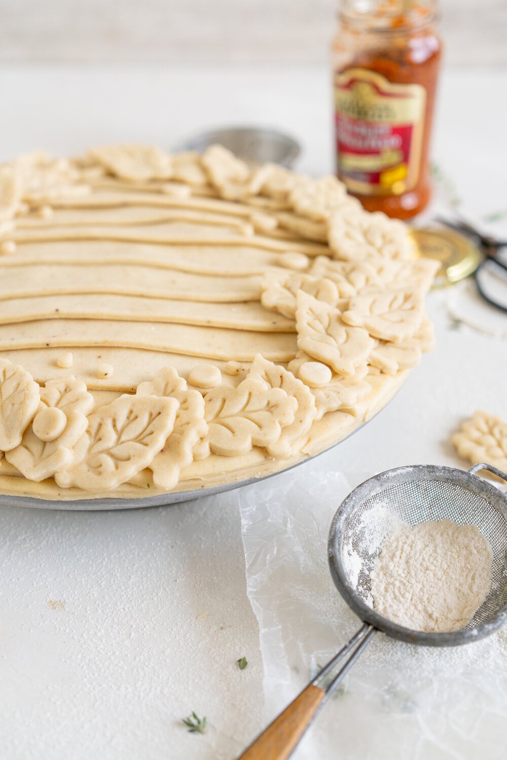 Mushroom and Sundried Tomato Pesto Pie with Parmesan and Black Pepper Crust. A rich, hearty mushroom gravy enriched with sundried tomato pesto is tucked inside a golden brown parmesan and black pepper pie crust. This is a perfect vegetarian take on the classic pot pie, and is ultimate comfort food. Mushroom pot pie will be your next favourite!