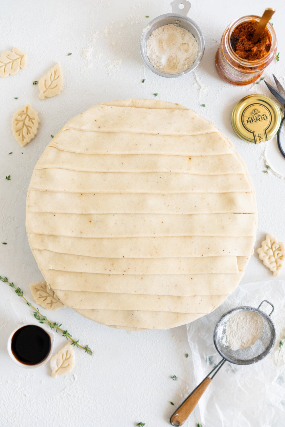 Mushroom and Sundried Tomato Pesto Pie with Parmesan and Black Pepper Crust. A rich, hearty mushroom gravy enriched with sundried tomato pesto is tucked inside a golden brown parmesan and black pepper pie crust. This is a perfect vegetarian take on the classic pot pie, and is ultimate comfort food. Mushroom pot pie will be your next favourite!