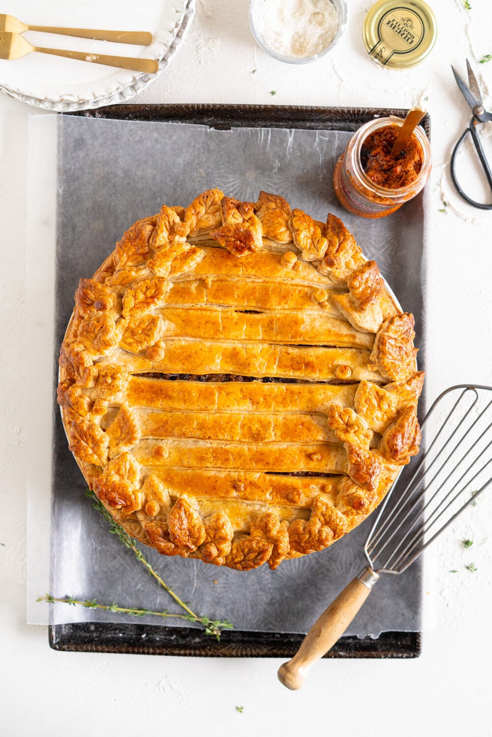 Mushroom and Sundried Tomato Pesto Pie with Parmesan and Black Pepper Crust. A rich, hearty mushroom gravy enriched with sundried tomato pesto is tucked inside a golden brown parmesan and black pepper pie crust. This is a perfect vegetarian take on the classic pot pie, and is ultimate comfort food. Mushroom pot pie will be your next favourite!