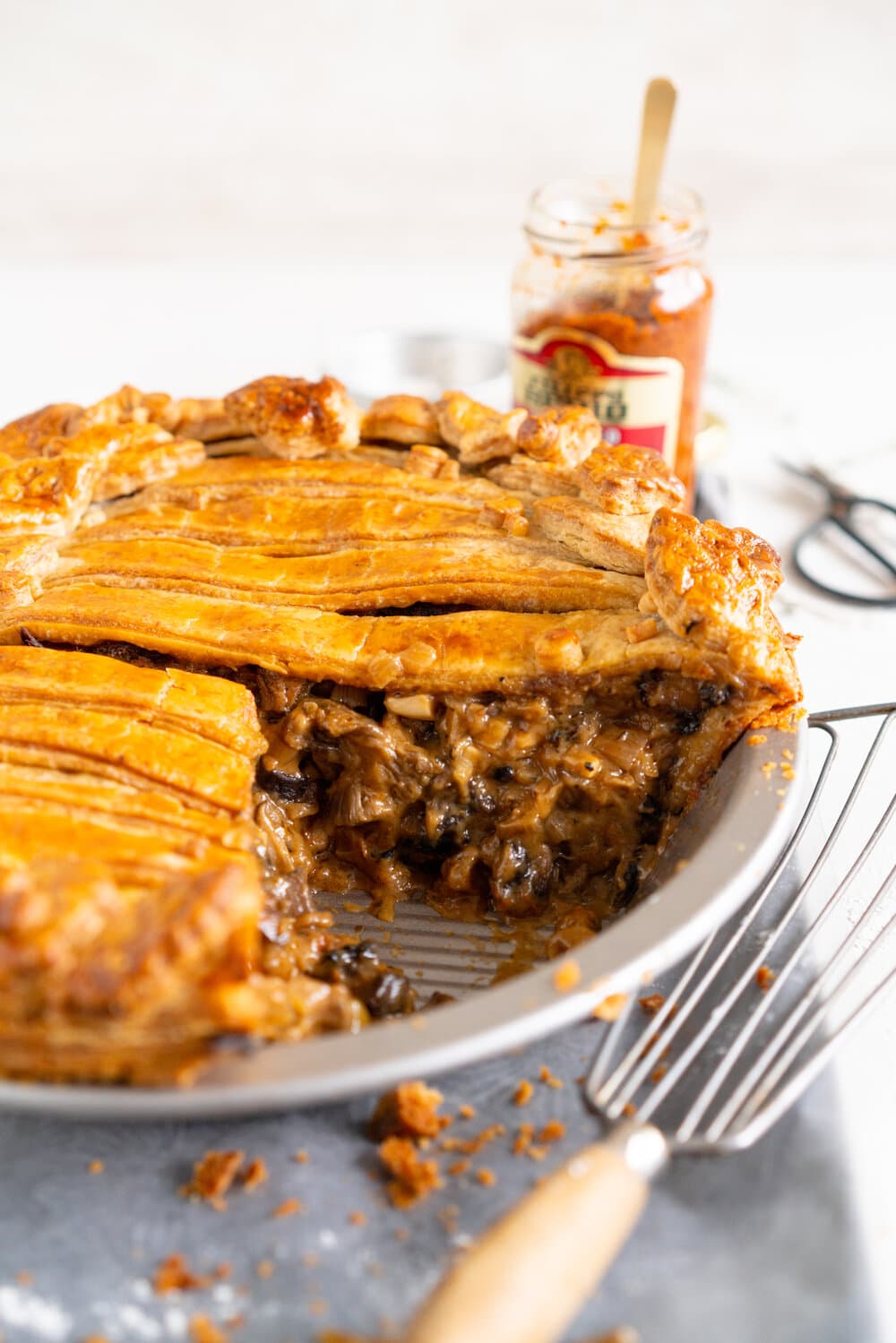 Mushroom and Sundried Tomato Pesto Pie with Parmesan and Black Pepper Crust. A rich, hearty mushroom gravy enriched with sundried tomato pesto is tucked inside a golden brown parmesan and black pepper pie crust. This is a perfect vegetarian take on the classic pot pie, and is ultimate comfort food. Mushroom pot pie will be your next favourite!