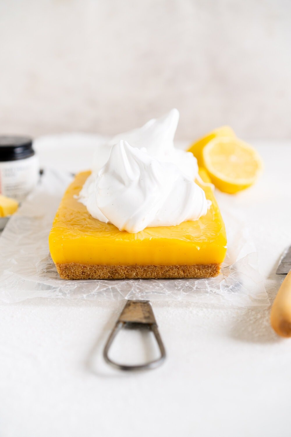 Small Batch No-Bake Passionfruit and Lemon Meringue Bars. A buttery graham crust is topped with a smooth lemon and passionfruit filling, and topped with a torched Swiss meringue. These lemon and passionfruit bars are easy to make and do not need an oven, making them the perfect summer dessert!