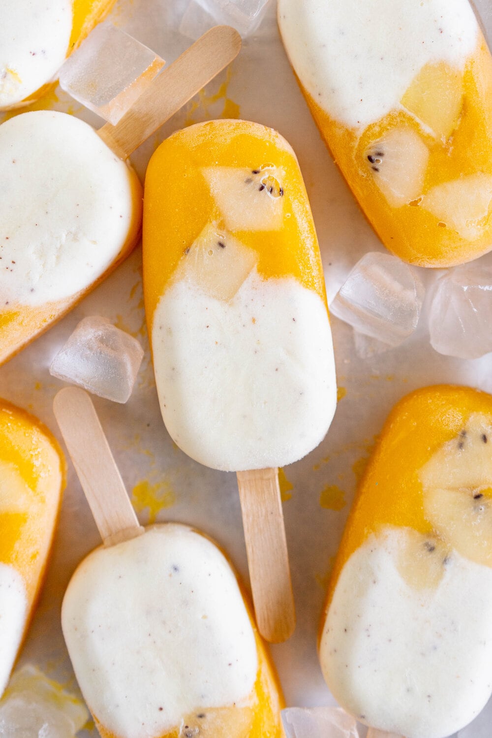 Kiwifruit and Mango Popsicles. Creamy Kiwifruit whipped cream and smooth mango puree are combined into this perfect popsicle. These pops are gluten free and super refreshing, and are great for using up summer fruit. There is no cooking required - simply blend up your fruit and you are ready to go!