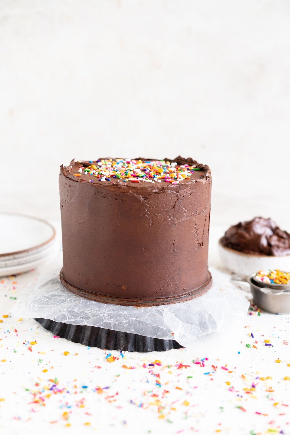 The most delicious, moist funfetti vanilla bean cake. This homemade funfetti cake has a yellow cake base and is made with buttermilk to keep it perfectly dense, and is packed full of Jimmy sprinkles. The confetti cake is layered with a rich chocolate American Buttercream frosting, and finished with more sprinkles. This is the perfect celebration cake, and at six inches it is great for a small group.