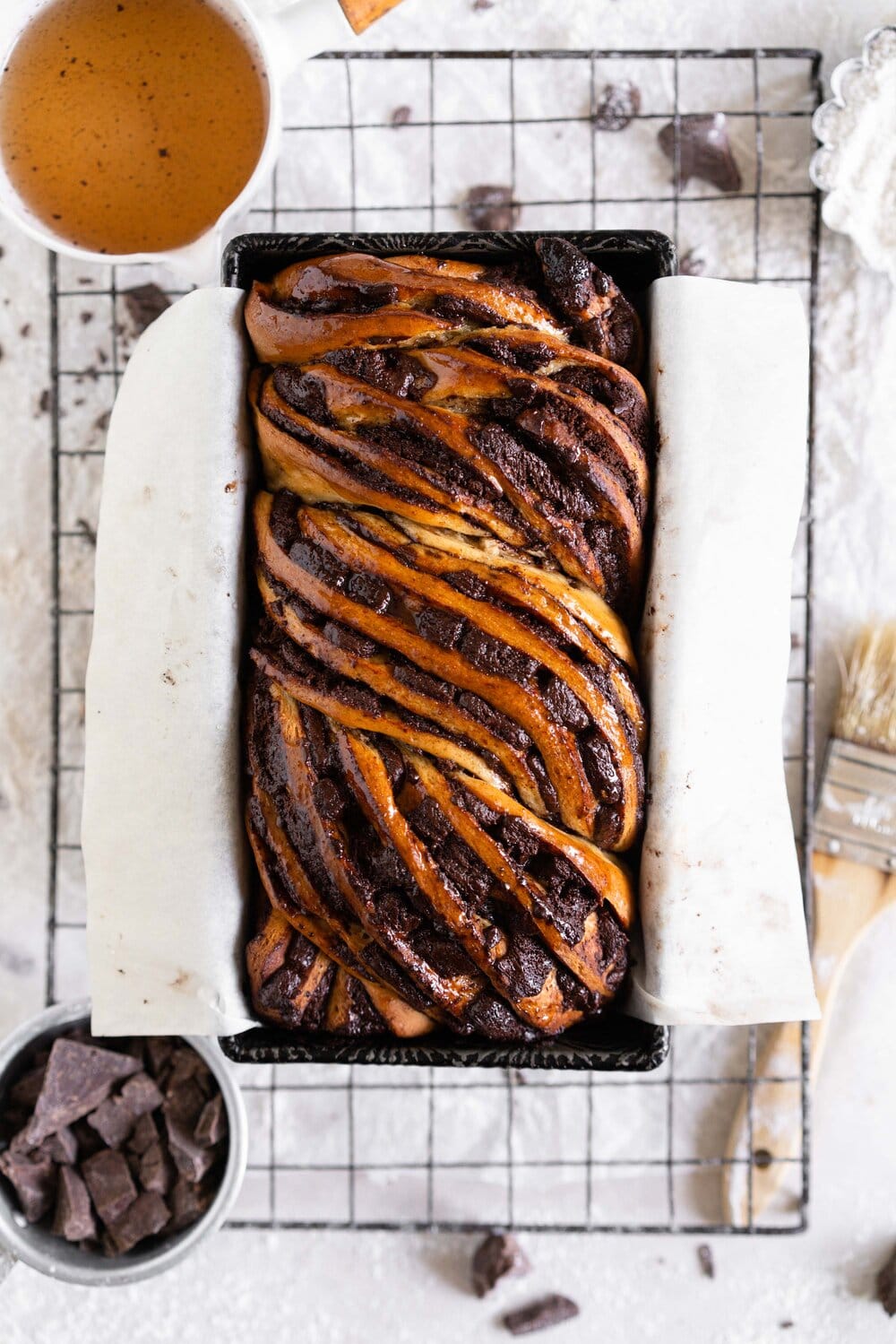 A super easy, rich chocolate and espresso babka made with a rye brioche. The brioche dough is super soft and fluffy, made with rye flour for a toasty finish, and is filled with an espresso chocolate filling and finished with a simple syrup to give it shine and lock in moisture