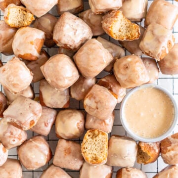 Earl grey doughnut bites on a cooling rack