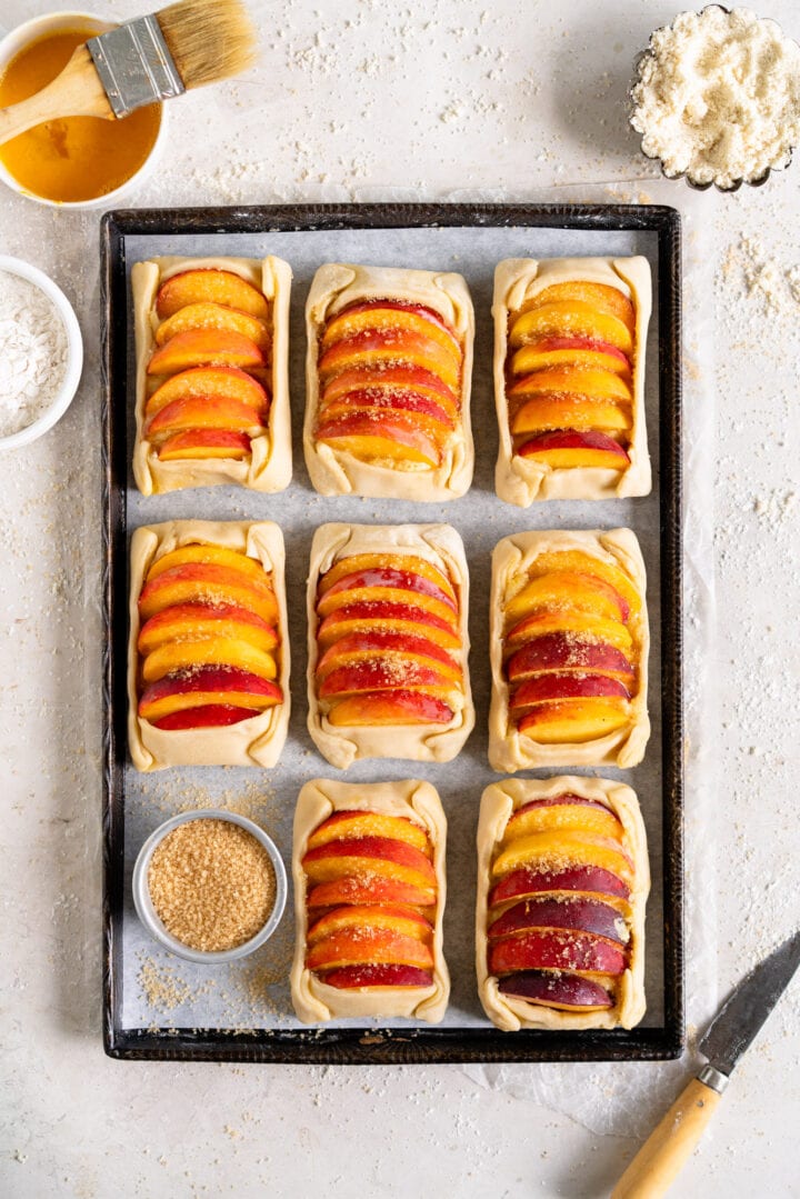 Unbaked galettes on sheet pan ready to go in the oven.
