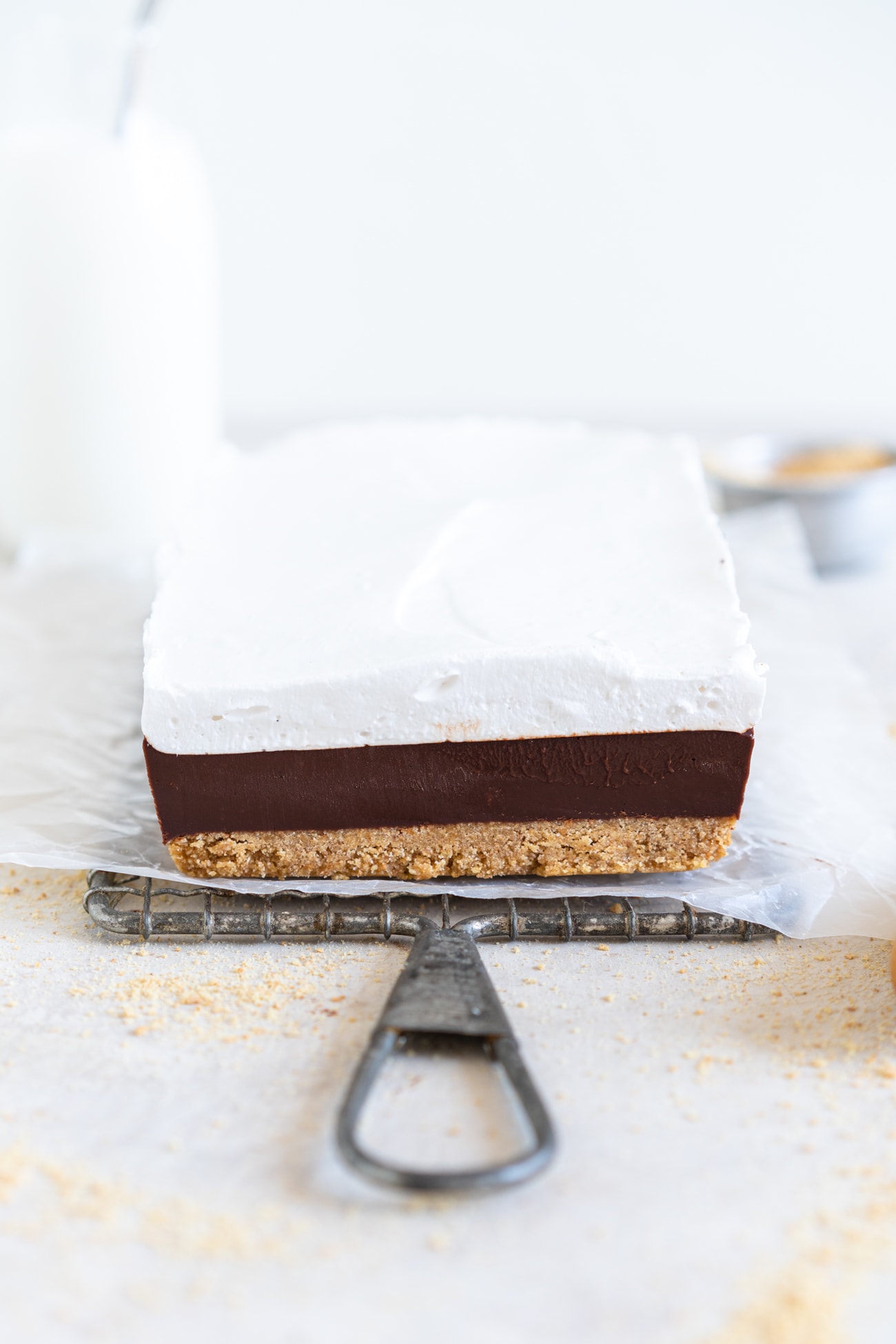 S'mores bar with layer of marshmallow ready to be toasted