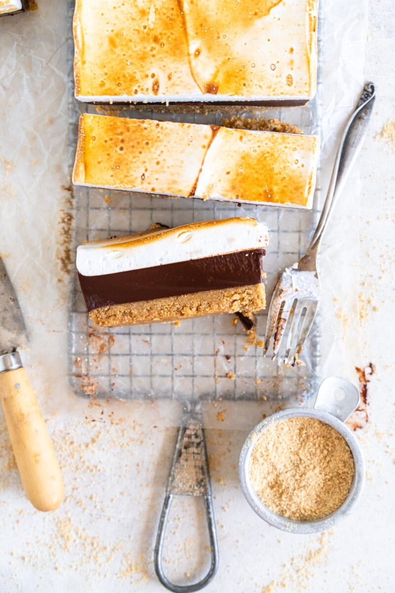 Top Down shot of bars showing graham cracker crust, chocolate filling and marshmallow topping