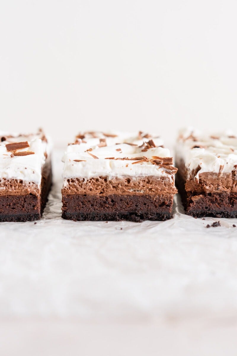 Lines of chocolate mud pie bars showing chocolate layers