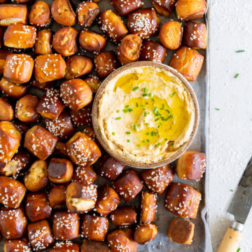 close up of pretzel bites with dip