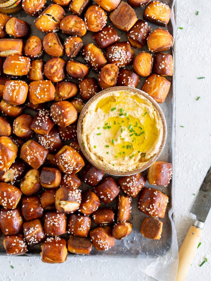 close up of pretzel bites with dip