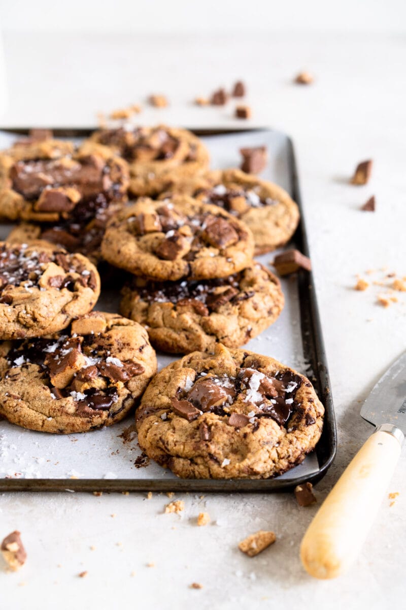 Side shot of cookies on a baking sheet.
