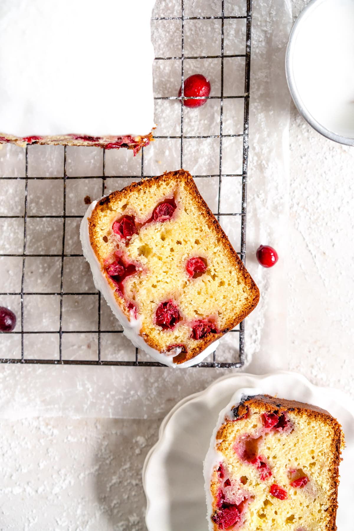slice shot of cranberry olive oil loaf cake