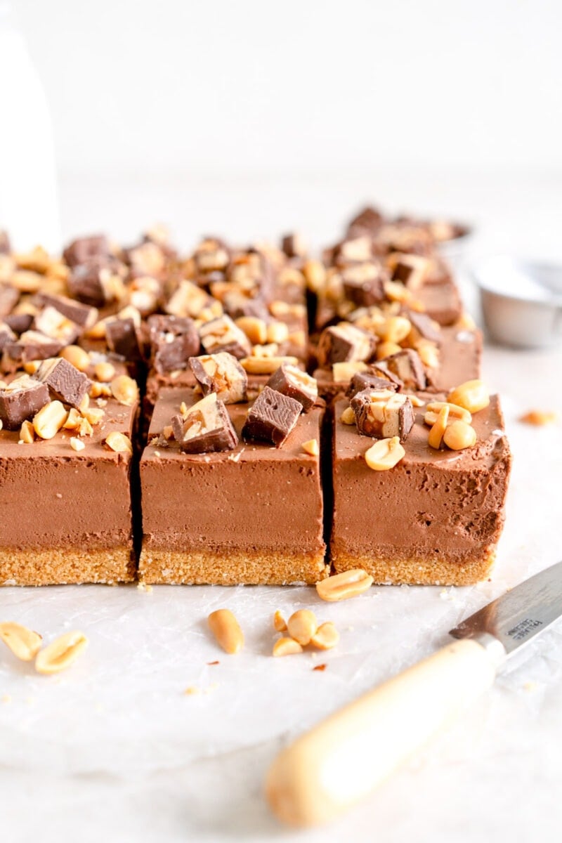 Cut up snickers cheesecake