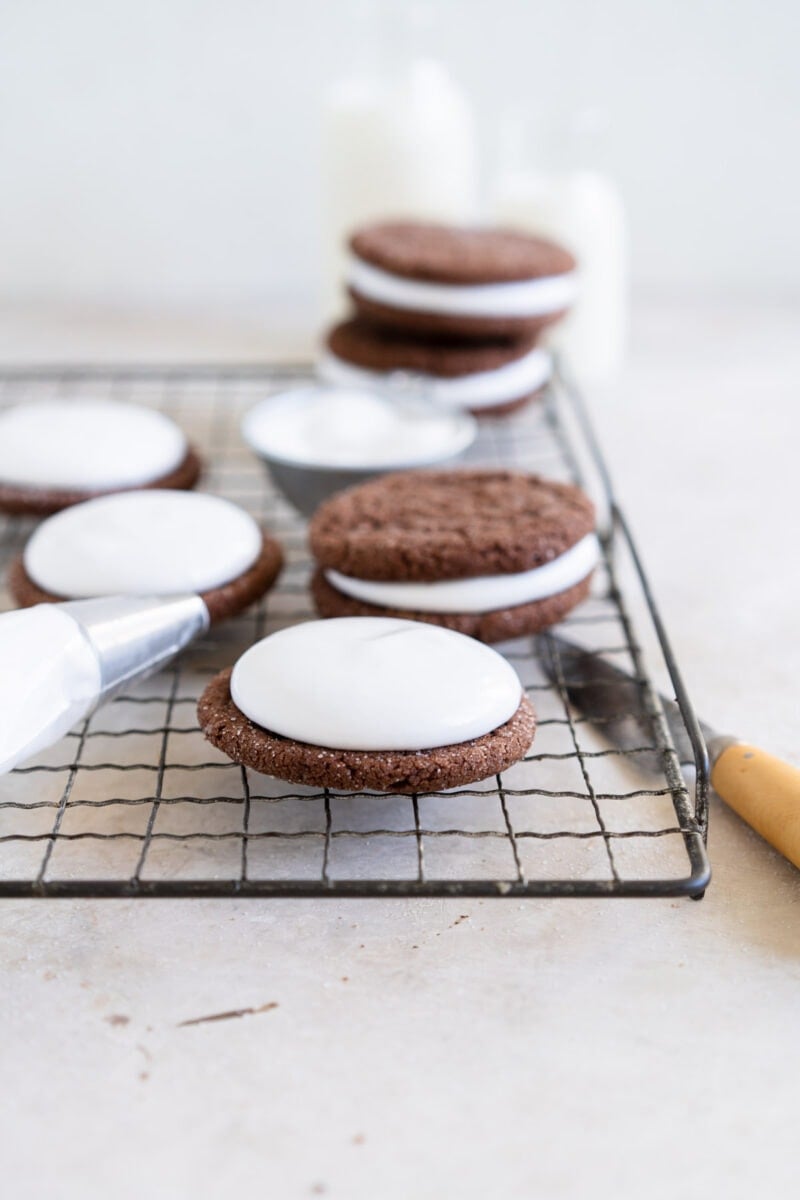Side shot of mound of marshmallow on cookies