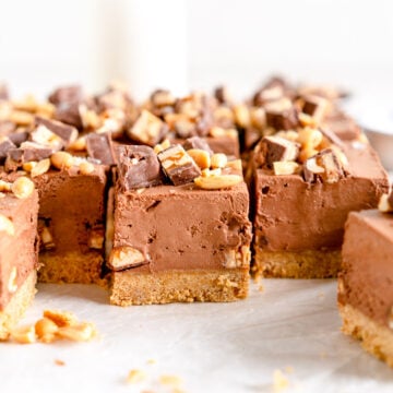 Side shot of No-bake Snickers Cheesecake